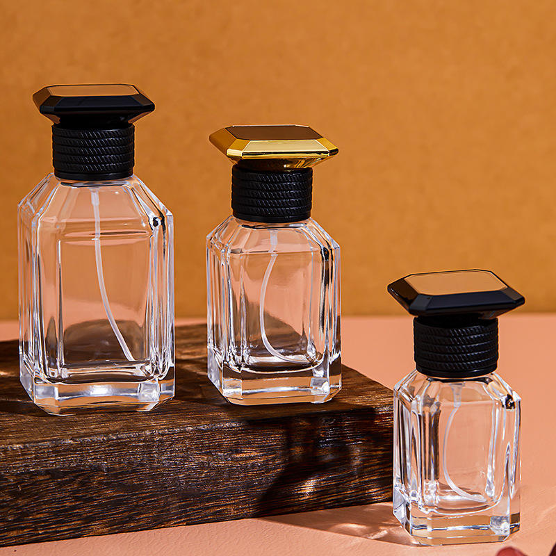 Wholesale Stylish Glass Perfume Bottle with Shiny Cap 30ml 50ml 100Ml Slant Shoulder Glass Bottle for Perfumes