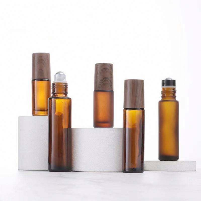 Luxury Perfume Essential Oil Roll on Bottle 5 10 15ml Amber Glass Roll on Bottle With Plastic Wooden Bamboo Lid and Roller