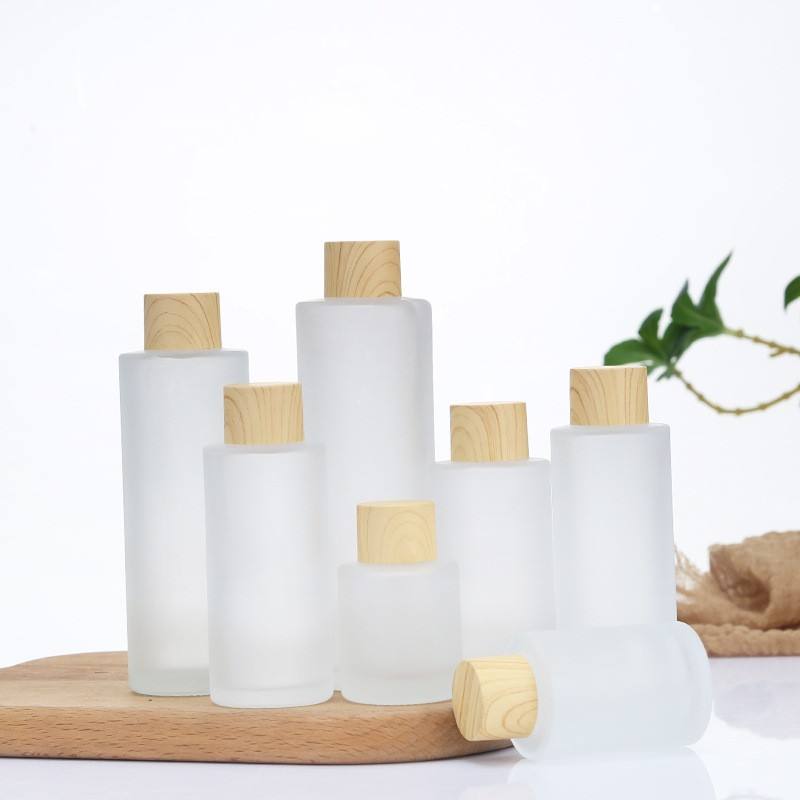 Hot Selling Flat Shoulder Glass Bottle 30ml Frosted Glass Lotion Bottle 100ml Essence Oil Dispenser Bottle for Cosmetic
