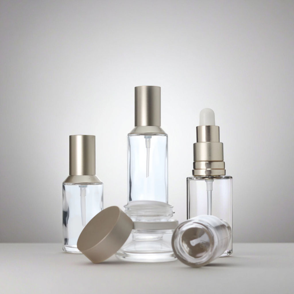 OEM 50ml 100ml 150ml Face Skin Care Set Lotion Cuticle Oil Bottle Cream Round Bottom Cosmetic Gold Clear Glass Bottle with Pump