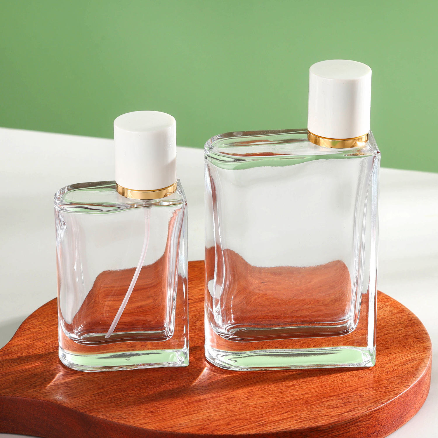 Wholesale Empty Perfume Bottle 25ml 50ml 100ml Transparent Perfume Spray Glass Bottle