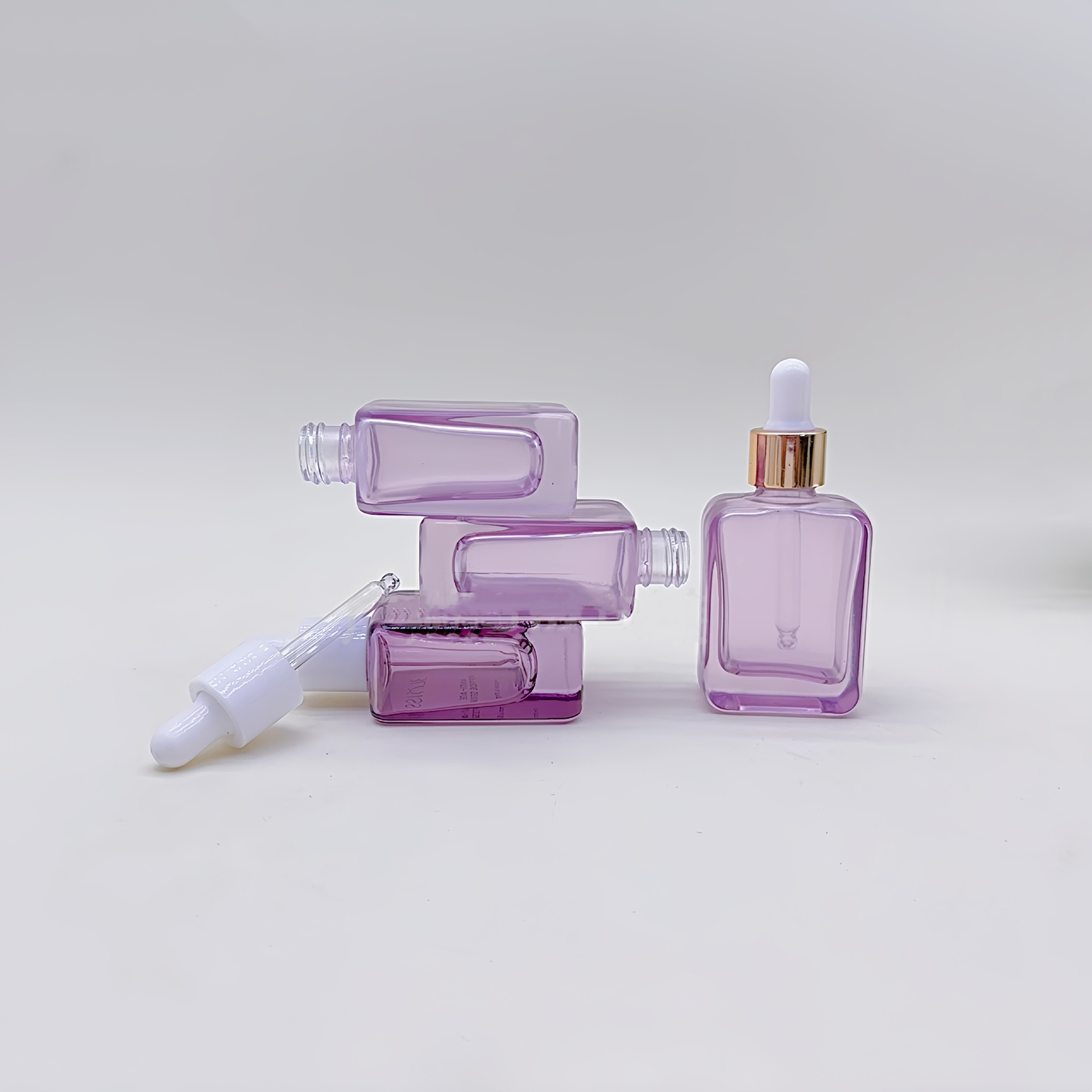 Manufacture thick bottom 30ml translucent purple flat square dropper bottle square essential oil bottle