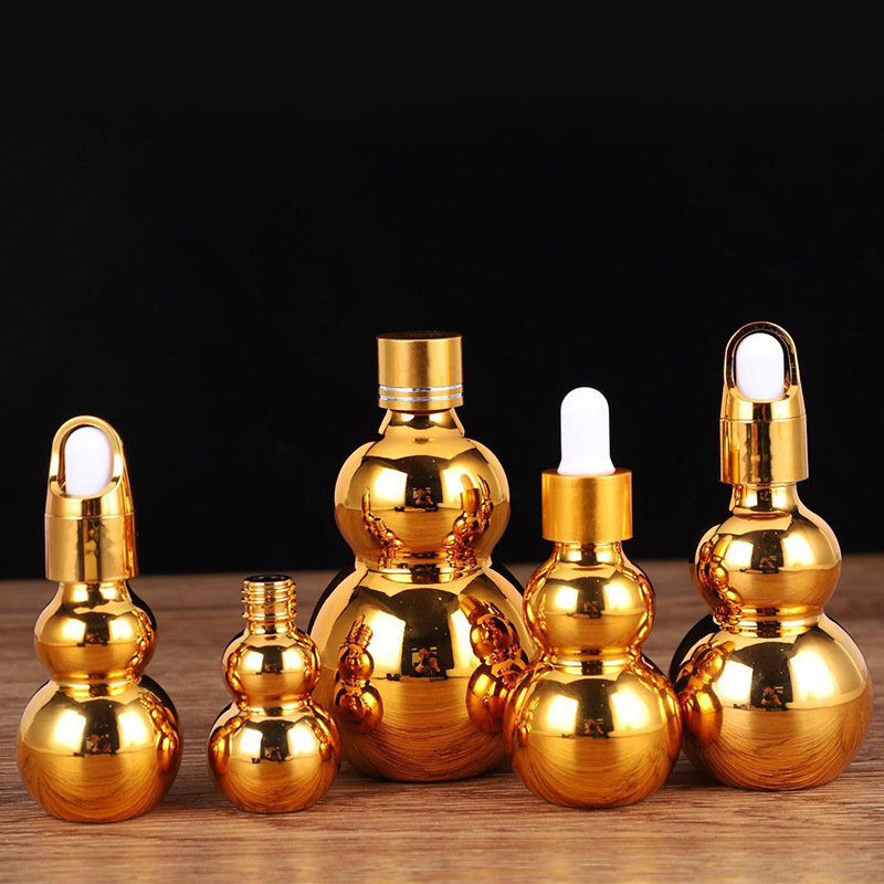 Customized electroplated golden glass gourd shape essential oil bottle
